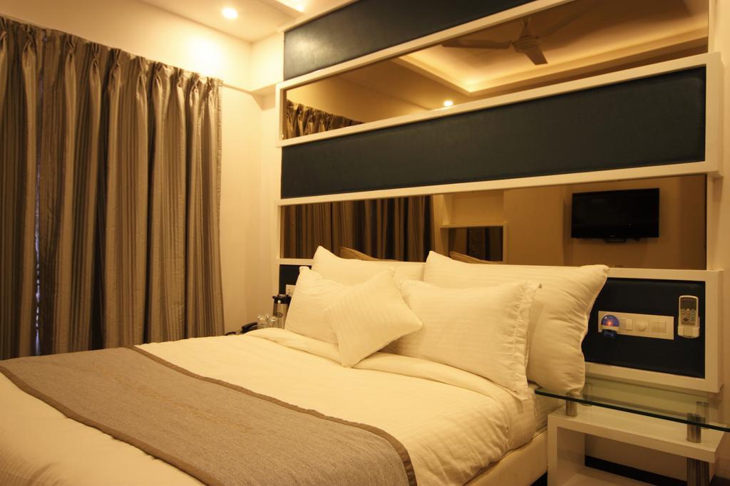 Hotel Bait Inn Αχμπανταμπάντ Δωμάτιο φωτογραφία